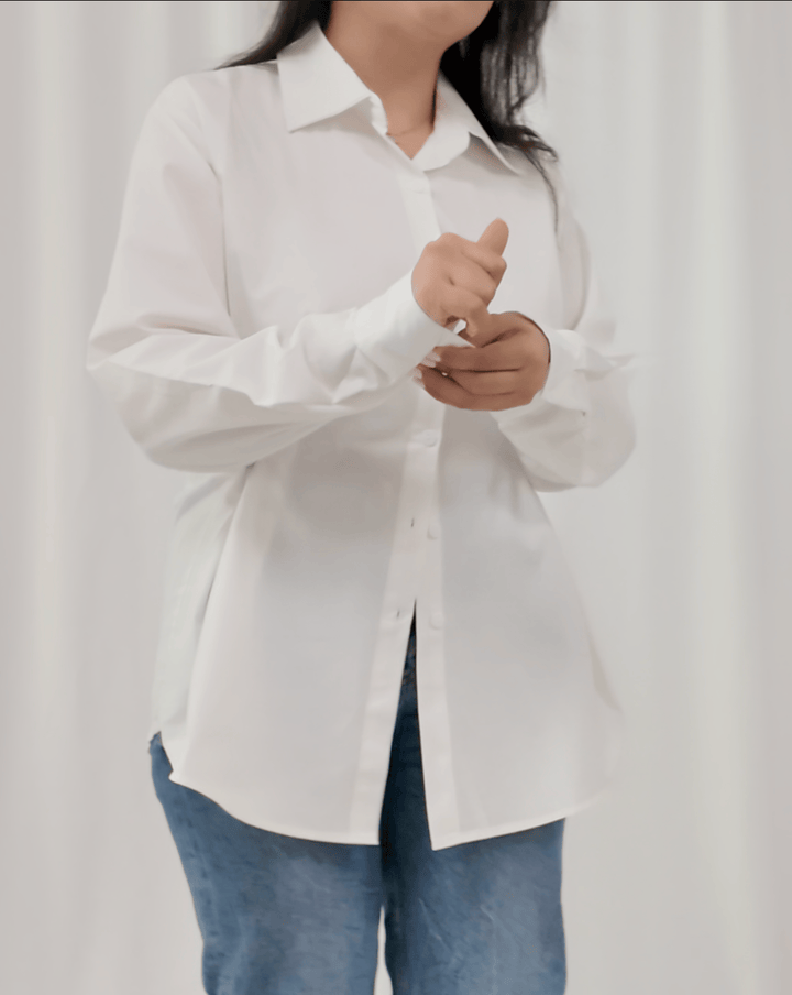 	Side angle of Pure Grace shirt with waist button detail by INNAM